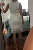 I loved this dress when I tried it on way more than I thought I would. The material is a little thin, doesn't feel very durable but it's super cute and sassy with the fringe and cut outs. Great length and overall true to size fit! - Jess C.