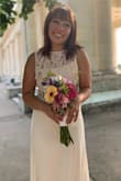 I wore this for my park wedding and loved it. definitely need a slip under it but other than that it was great - Jasmine B.