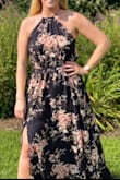 I absolutely loved this dress and got so many compliments on it. I ordered a medium and had to getting it altered on the top and altered the length. But, I didn't mind because the dress was beautiful. - Nora R.