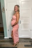 I could not find a maternity dress that I liked. I knew what I wanted, but was just not finding it. Having really liked Lulus dresses in the past, I decided to order this dress and just get a medium instead of my usual small. It worked! I was 31 weeks pregnant and the dress has enough give to accommodate for the bump. It was a little bunchy in the back, but not bad, especially considering it is not even a maternity dress. It was a nice quality too. I will once again order a dress from Lulus for future events. - Michelle R.