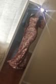 Very beautiful dress! I bought it for my elopement wedding. Loved the fit, the feel & the look. The silhouette of the dress gives your body a nice shape. Overall 5 stars - Kanchan D.
