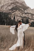 I loved the dress. It was perfect for my elopement! Fits true to size! I didn't even need to wear a bra with it! - Marissa C.