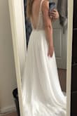 THIS DRESS IS BEAUTIFUL! Long story short I purchased both a size 0 and a 2 (they frequently go out of stock) and have tried them both on. The 0 fits me better, it's just a tad loose in the bodice and the length is very long. Easy alterations that shouldn't be too costly. I plan to wear this for my wedding next August and I cannot wait! The beading is amazing and the bodice is sheer, which isn't too obvious with my light skin. I will likely have the front lined for modesty, but it is beautiful as is and I love the low back! As I mentioned, the length is long (I'm petite so there's no surprise there) but I want to keep the length in the back for a train. Also, the shipping was extremely fast and Lulus offers free return shipping within 10 days if for whatever reason you aren't satisfied. 10/10 would recommend! - Katherine B.
