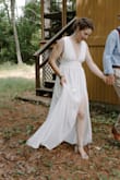 I ordered 15+ dresses from David's Bridal, Free People, Lulus and other sites looking for the perfect COVID wedding dress, and this was THE ONE! It was just the right combination of bohemian flowy style, comfort, and simple beauty. It fit me like a glove (I had the straps taken in a little to make it 100% perfect). Not only did I feel beautiful, but this dress was so comfortable that I rock climbed up in 95-degree heat to my ceremony while wearing it. And it still looked great when I got there. We only had 6 wedding guests but this dress was so wonderful that I am considering wearing it again for my bigger party when COVID is over. Based on online pictures, I did not think this would be my first choice, but it was!! One last note, it was a little long for me with flats or short heels, but I didn't mind. If you are 5'6' or under you may choose to get it hemmed. - Lisa B.
