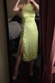 I loved this midi dress. The material is soft but wrinkles easily. The hem cuts right at my calves, so wearing heels is a must. The back of the dress is stunning. - Sarah M.
