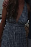 I loved this dress, but it shrunk a little after one wash.The material isn't amazing, but it is good for casual settings. I regret not getting the S. The halter tie is cool, because you can tie it many different ways! Sorry the picture quality is quite poor. - Sarah M.