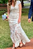 I ordered a small and it was true to size, I felt so comfortable and beautiful. I was asked by multiple people where I purchased the dress from. - Anna T.