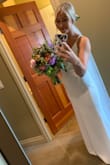 This was the most beautiful, simple wedding dress for my beach elopement. It was thick enough so you couldn't see any panty lines but not heavy. The material is very good quality- similar to crepe material they use for high end wedding dresses. I got so many compliments on this dress! People couldn't believe the price. The only alteration I did was got it hemmed and removed the adjustable straps. I would recommend this dress to any bride-to-be! - Camille M.