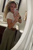 The material is soft and on the heavier side, which I love because it doesn't feel poorly made. This dress is also the perfect length for my height! I have an hourglass shape, so it can be hard to accommodate a smaller waist and larger hips, but I wore it high-waisted and it was flattering! Many compliments! - Alana A.