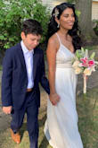 The dress is incredibly comfortable. I ordered a Small which fit perfect on my waist (I'm a size 2P). It had to be hemmed and taken in at the sides of my bust. Worth the alterations. Received many compliments. Very classy for a second wedding. We had a backyard intimate wedding. - Wendy C.