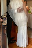 This dress is absolutely beautiful! I got compliments from my family on it all day long. Fit so comfortably and loved the detailed beading and cool geometric shape along the bottom. I wear a 4/6 in dresses so sometimes I need a medium but the small in this dress fit perfectly! I have a different dress for my larger wedding in 2021 that could not have arrived on time but for our quick COVID wedding, this worked perfectly in a pinch. - Camille C.