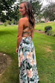 I got so many compliments on this dress! Normally I wear a small in Lulus dresses, but I read reviews that said to size up and ordered the medium. It fit perfect! It's definitely long. I'm 5'8" and wore heals and still had to get it hemmed. - Megan C.