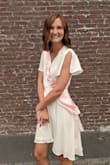 This dress is amazing and I received soooo many compliments wearing it. Dresses usually end up super short on me because I'm long-legged but this was very classy. I did have to use fashion tape for the chest but that was just me being modest. - Haley W.