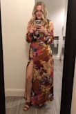 This dress is so comfortable, flattering, and sexy. The silk feels like pajamas, the colors are so vibrant, and the wrap style and low-cut neck looks so good. I got so many compliments and I felt amazing and so comfortable all night. I highly recommend this dress for an event! - Hayley H.