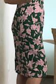 I LOVE this dress! As always LULUS quality made me happy once again! The fabric feels wonderful. It's well made. I come from a family with a few seamstress, so, I value a good product. MORE importantly it fits well, the cut helps you slim down. The color is gorgeous and a picture does no justice. It can dressed up or dressed down. I bought it a size up because I wanted it a bit loose and still is gorgeous. BUY IT! - Angelica L.