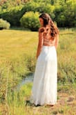 This dress is exactly as described! I wore it for my wedding pictures (canceled ceremony due to covid) and it was perfect! I am taller so it was just barely long enough for me but that is what I expected because of other reviewers. I have slightly larger breasts and didn't wear any support and it was OK, if I was wearing it all night for a ceremony and reception I might have tried to find some support that worked with the dress. I did have to tie it kind of tight for it to stay in place but it didn't slip around and wasn't uncomfortable. Best wedding dress for the price, couldn't have asked for anything better. I ordered a Medium. - Kelsie G.