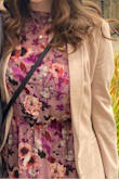 The top of the dress was slightly looser than the picture on the model and the waist seam was a bit looser tool, however the dress was comfortable, nice looking material and length. It's slightly silky, not cotton. I got lots of compliments wearing to a fall wedding. Definitely recommend for a conservative event. - Ella Z.