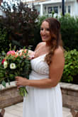 I felt so beautiful in this dress! It was a bit long, but my mom gemmed it for me and it was perfect for our romantic ring exchange - Robyn P.