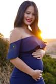 Fits my curves in all the right places. I bought this dress for a maternity shoot. Hugs the baby bump just right and makes a new mama like me feel sexy. - Xompratai S.