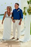 I purchased this dress for our 20 yr vow renewal and have had so many positive responses on this dress! It's absolutely gorgeous and was perfect for the occasion. I ordered a medium and had to have it altered on the top and shortened just a little. It's one of my favorite dresses! - Jessica N.