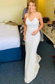 This dress was beautiful! Perfect for my mini wedding ceremony! We're having the big reception next year, but this was perfect for getting married on the beach. Came in super quick and fit perfect! I used a $17 sticky bra from target since the dress is backless and it was perfect.
The only thing I would say is you have to keep it pulled down because it kind of bunches up in the waist. If you have time to get it altered, it would look even better, but I didn't and it still looked awesome. With the money you save on this dress you can definitely splurge to get it fitted to your body! - Jord B.