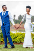 I wore this dress to my wedding on 29th August 2020 in Nairobi, Kenya. I always knew that I wanted an understated yet elegant dress. Most bridal shops in Nairobi sell traditional wedding dresses: puffy ball gowns or mermaid style dresses with a lot going on. Atelier shops are also fairly expensive. I knew I wanted to import an affordable gown then make adjustments to it. I bought this dress in December 2019, and my choice became even more appropriate when I had a small COVID wedding. I didn't really have any qualms about shopping online for this dress and having someone bring it home for me.
The dress fit perfectly. I had to get the bust and arms taken in a little. The back of the dress is the highlight. I had a gold chain attached to the back to draw attention to this area. The only thing I did not like was that the inner layer was longer than the dress. I had it shortened but then I cleaned the dress and the lace shrunk a bit, leaving the inner layer longer. Aside from that, the dress was spectacular! - Ivy M.