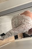 I bought this one and the "awaken my love" dress and I love this one way more. It's silk lined underneath and feels really high quality. The back has see-through lace (like the arms) but I'm wearing a nude bra in the photos and it's not too noticeable. Really happy I took the chance! - Alissa H.