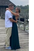 The dress can be tightened on the top with adjusting the straps. I absolutely loved the back on it. It's very long so if you are only doing photos in it you're fine, but if you plan to walk in it all day you'll need a hem. 
Very comfortable. - Christine H.