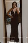 I love this dress!! I usually wear an XS/S and the reviews made me order a S (said it ran small). I'm so glad I ordered a S and not XS. It's just the right size, not too loose not too tight. You'll have to wear sticky boobs or pasties (or nothing at all) because you can see a bra through the mesh. There's a thicker under layer so you can't see underwear. The only downside is that I'm short and needed to get a decent amount hemmed even with my highest heels. You'll also need some static spray to keep that puppy off of you. - Taylor S.