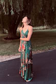 Just wore this to my cousin's wedding. My sister loved it so much she is considering it as her bridesmaids dresses. It's silky with a little weight to it. It feels rich and buttery! Love the green color! - Danielle C.