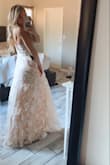 I love the dress on the hanger but when I put it on I felt like Glenda the good witch. The color is nice. - Haley C.