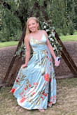 This dress is beautiful! Great quality. I wore it to a wedding and go so many compliments! The side slit and long skirt make it super fun and comfortable to wear!! - Nicole T.