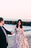 I bought this dress for my engagement photos and boy was it such a great choice! I had originally ordered it in an Medium but it did not fit my bust so I exchanged it for a large. The large was slightly loose on top, but nothing a quick pin couldn't fix. If you are considering this, definitely go for it! The dress made me feel beautiful and was made so gorgeous! I got so many compliments on it! - Jennie K.
