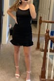 I really liked this dress but a medium was a little big but still wearable and the ruffles on the bottom we're super cute!! - Caitlyn M.