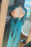 Always a risky move to buy something that doesn't have a model photo or reviews but this dress is a very soft tulle feel and is definitely one of my favorite new dresses!! So flattering! Only bad this its a wide deep V neck so I will get it sewed in the middle - using it for my engagement photos! I got a size large - Ariana P.