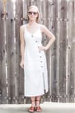 Such a classic piece! Perfect for brunch or a summer day. The lining makes it clean and comfortable. Slit is very tasteful. Who knows, I might need one in another colour. - Raquel G.