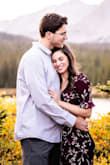 I wore this dress for my engagement photos and I absolutely loved it! It fit perfectly and there were no issues with it slipping off my chest. I have big hips/butt and this dress... no problem for this dress! - Rachael G.