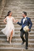 I had been searching for a dress that made me feel va-va-VOOM for my elopement in Tuscany in June. This dress is beautiful, simple and really flattering. Perfect ivory color. It gives me more of an hourglass waistline than the fit and flares, and it's soft and REALLY comfortable. No bra needed but surely some fashion tape! I took a few inches from the bottom leftovers after hemming (it's 3" too long) and created a soft little removable pleated fabric swag like the arm sleeves across the lower bust, just to demurely veil the deepest part of the plunge. I would have been self-conscious otherwise. The seamstress also cut the slit a bit higher to mid-thigh as in my photo and took in a bit from the sides. I wore 3 inch heels. Husband went CRAZY. : ) Looks like a much more expensive dress, really high-quality. - Erin O.