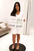 I wore the white version in a small to my wedding dress appointment and it was exactly what I envisioned. I'm usually a medium, but the small was the right length for me and still not too tight on the shoulders. This dress is super comfy and you can make it as formal as you like! I wore these with Lulus Raelynn heels. - Anja G.