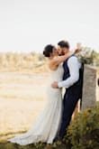 I ordered this dress for my wedding in Florida, however it got cancelled due to Covid. We ended up having it where we live in NH at a barn. 2 completely style weddings but great thing about this dress is it's very versatile. It went great with both themes. For is true to size. For like a glove, only alteration I needed was length. It is very long. But that was an easy fix. Super comfortable and I got so many compliments. I left as is and didn't add any ribbon or belt around the waist. But I've seen it both ways and both look great. If you're like me and a traditional white gown isn't for you I would go for this one. - Erin G.