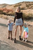 I love this skirt! I paired it with the Lulus Basic Scoop Back Bodysuit in black. The skirt feels high quality and I love the corduroy detail. True to size for me and I plan to buy the green one as well. - Amy A.