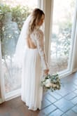 I got this dress for my elopement and the quality and detail of this dress was amazing! I did have to get it altered as it was too long for me and the waist was a little too big. But overall amazing dress and the back is to die for! - Krista M.