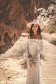 This dress was everything I wanted and more for my desert elopement! A literal dream. Although it was a little long, I wore 2.5' heels and it turned out perfectly fine. It hugged me in the right places and showed off my figure. Would 110% recommend. Super elegant and romantic! - Frencezz H.
