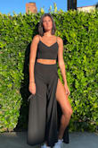 I wore this two piece out in Santa Barbara when I visited my sister and I got tons of compliments on it! The pant slits make it nice and breezy and fun to walk in :). The pants were a great length for me because my legs are so long and I appreciated that they didn't drag! - Kellyn S.