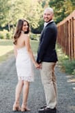 I have gotten so many compliments on this dress from my engagement photos.  It really complements your shape, while still trying to be conservative and elegant.  Since my legs are shorter, I got it hemmed so that it hit me right above the knee so that my legs appeared longer. I found the midi length for me, cut at a weird spot. The buttons at the top are tricky to snap on by yourself but seemed to be fine once they were in. Strapless bra was fine here as the back wasn't super low. Looking forward to wearing it again to my rehearsal dinner!! - Celine D.