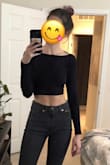 Party in the back! So cute and the material is really comfortable, kind of like a spandex feel almost. The sleeves are long (they go past the wrist if you know what I mean) which is always amazing. Dress up or down! - Juliette W.