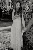 Absolutely loved this dress for my small outdoor wedding! I ordered this dress a couple weeks before my wedding after feeling serious regret with my original "designer" gown. So happy I went with this dress. The lace detail is beautiful and it's so comfortable, too! I ordered a small and medium and ended up keeping the small only because I liked the tighter fit. Both fit very well though! I didn't need any alterations. - Sydney W.