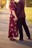 I had been debating about getting this dress for a fall engagement photoshoot for like 2 months and when it came back in stock I finally decided to get it. I'm 6 feet tall and 38DDD and the XL fit perfect - it was actually long enough for me! Only note is I would recommend pinning the fabric under the skirt so it doesn't blow open during photos and maybe an extra safety pin under the little clasp on the chest since that popped open a couple times. I also added a braided leather waist belt. Definitely plan on wearing this as a wedding guest/out to dinner as well! - Julie J.