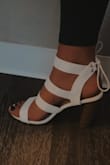These shoes are so so cute!  They fit well once on- I had a little struggle getting the straps over my foot as I put them on but you can just kind of force them to go through and then the fit is perfect. They are surprisingly comfortable and stable for being 4" tall. - Sierra O.