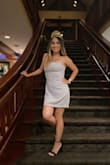 This dress is the perfect combination of classy and sexy! I love the texture, material and color of this dress. I received tons of compliments too. The dress is a bit loose, but I wouldn't size down. It's totally worth the purchase...get the dress! - Norma R.